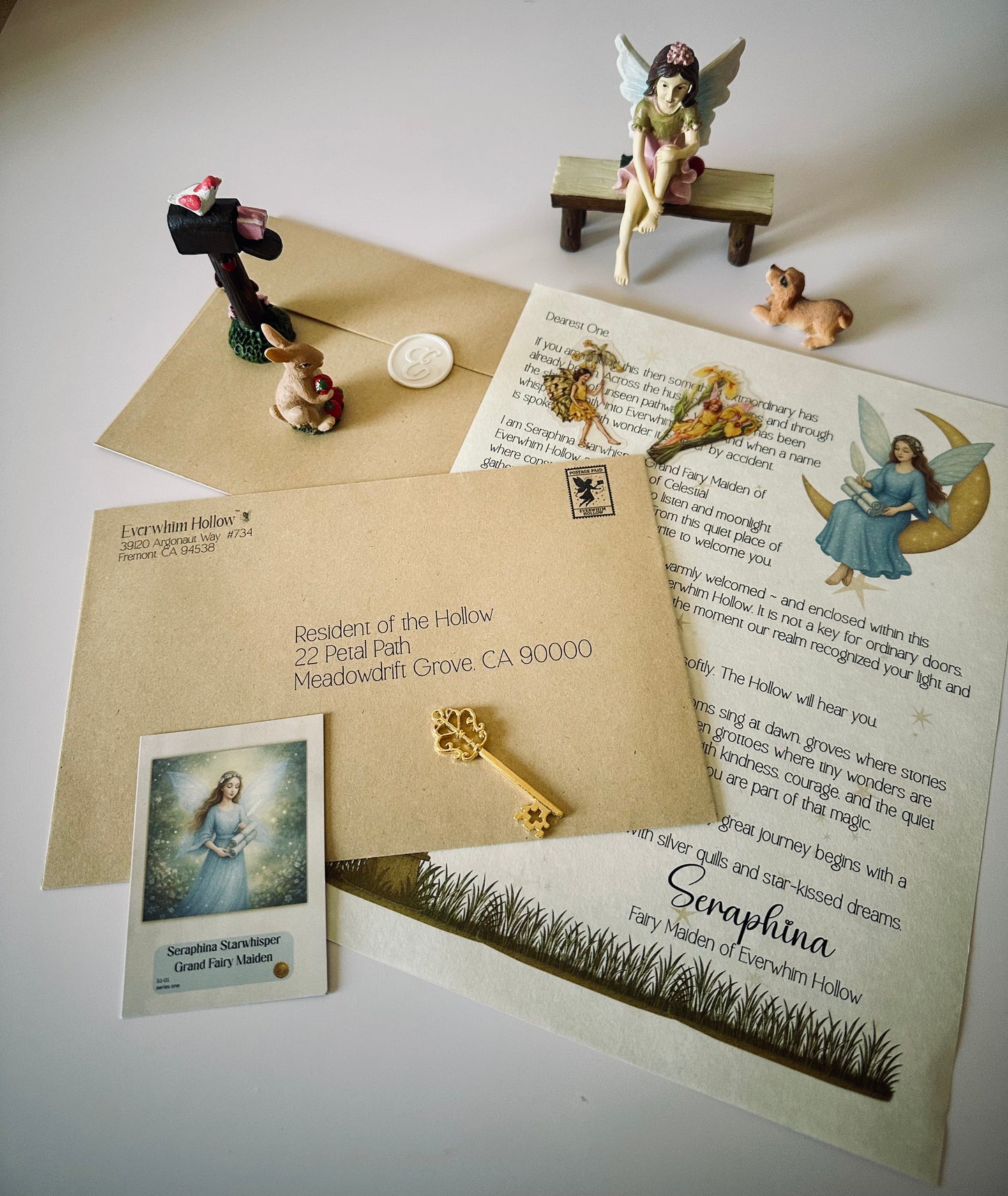 Everwhim Hollow first letter from Seraphina with trading card stickers and key to the Hollow